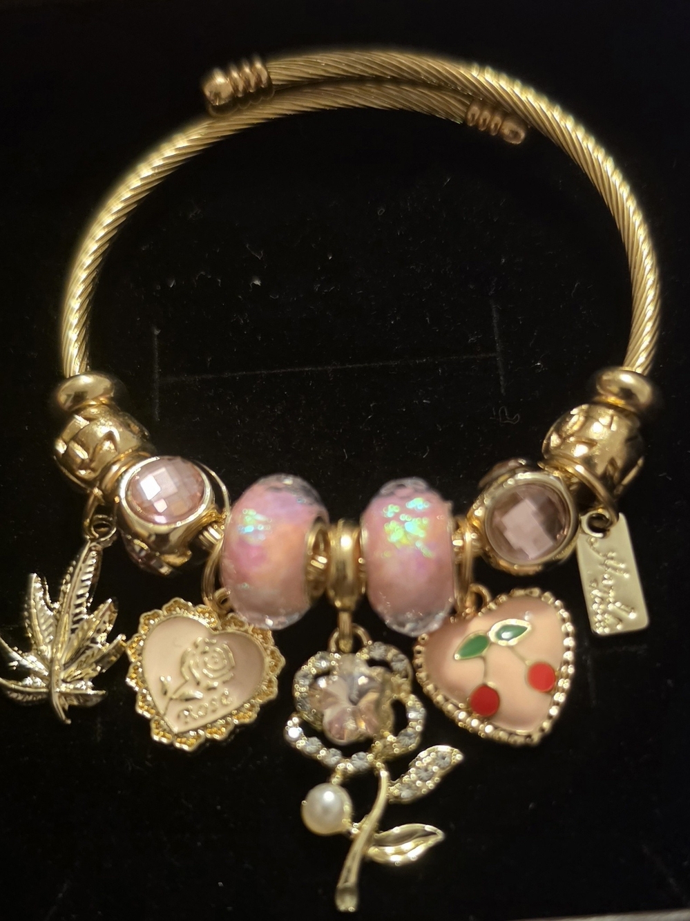 Gold-Tone Charm Bangle Bracelet with Pink Glass Beads and Enamel Charms